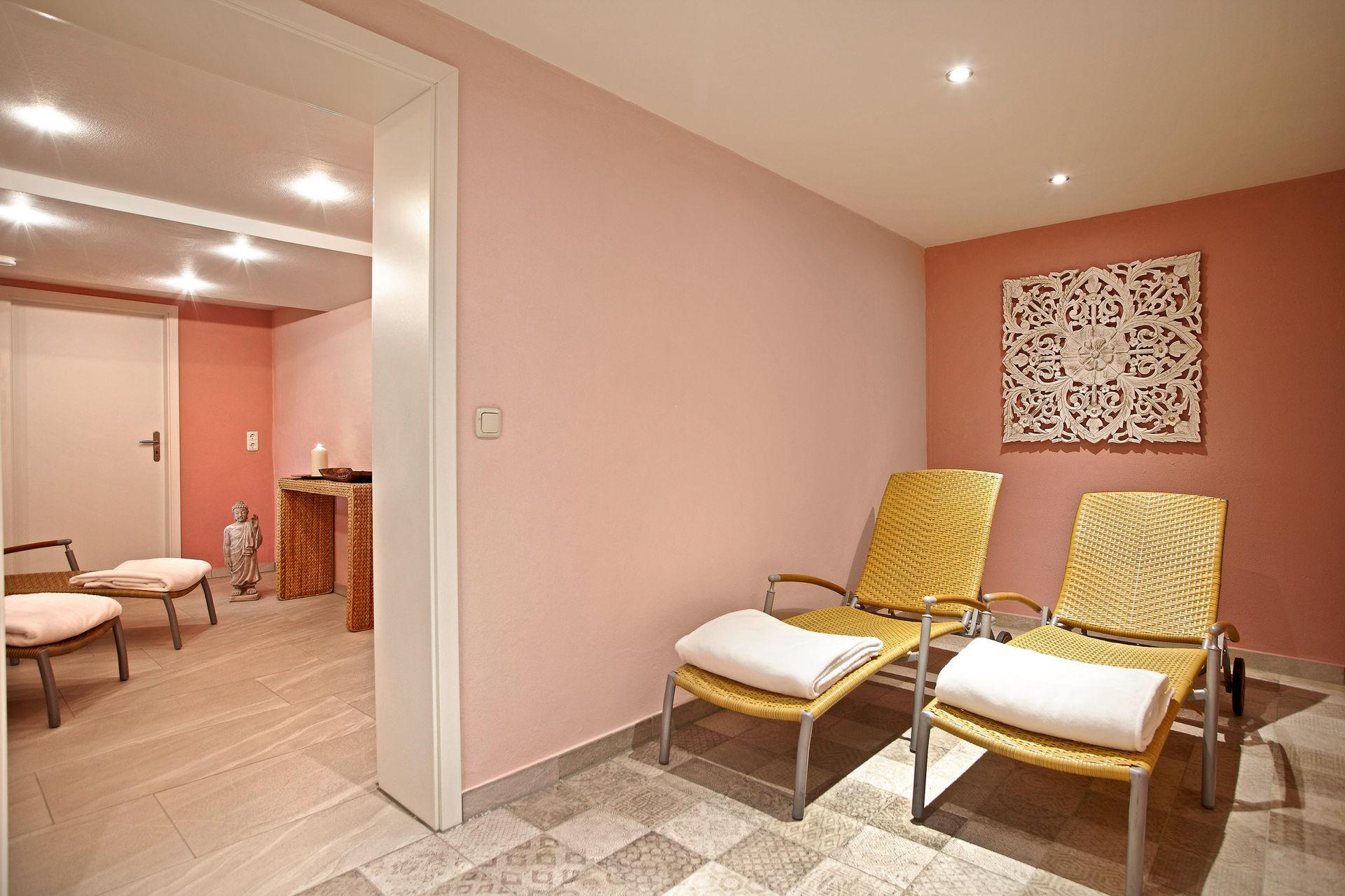 Quiet area with two loungers and fresh towels.